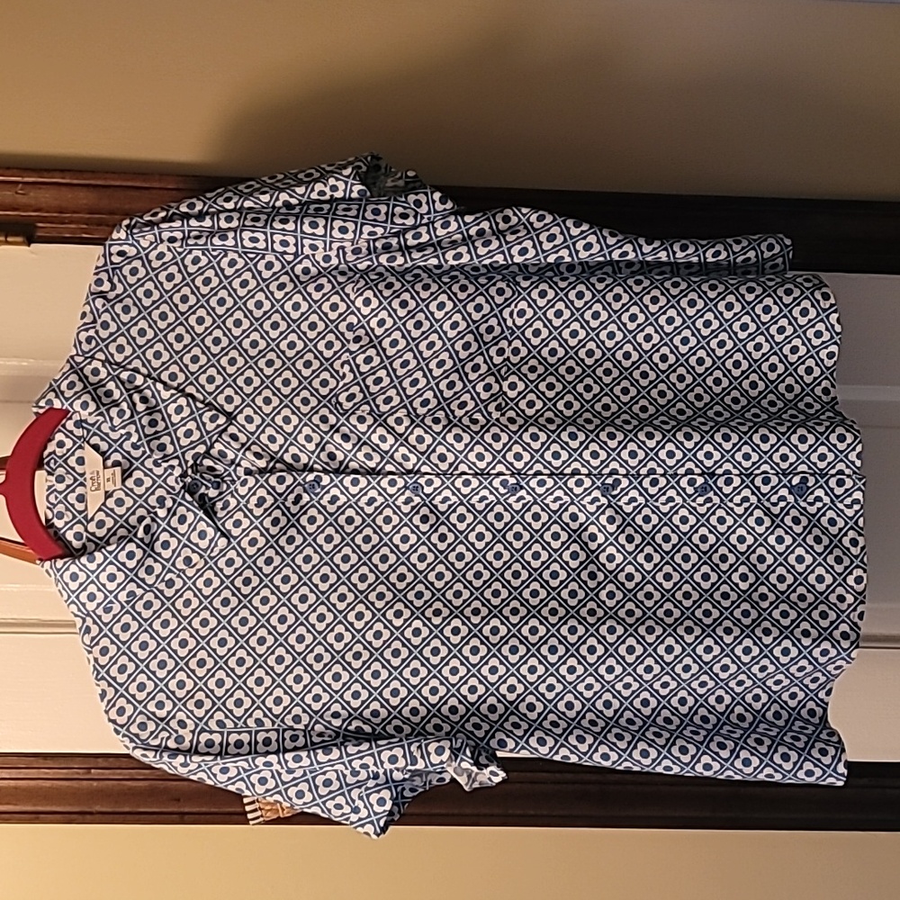 Cute button down short sleeve top.  Worn one time.